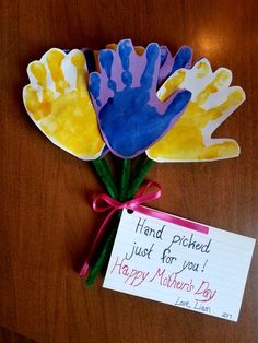 handprinted flowers with a note for mother's day