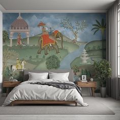 a bedroom with an elephant mural on the wall