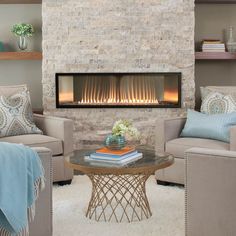 a living room with two couches and a fire place in the corner, sale save 10 % coupon code gas