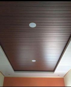 the ceiling in this room is painted brown