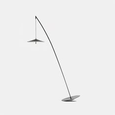 a floor lamp that is standing in the air