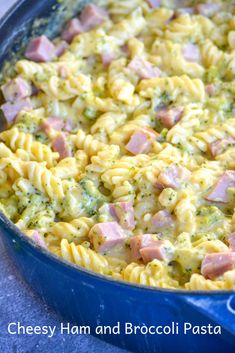 a casserole dish with ham and broccoli in it