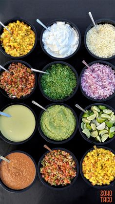 six bowls filled with different types of food and dips in them on a table