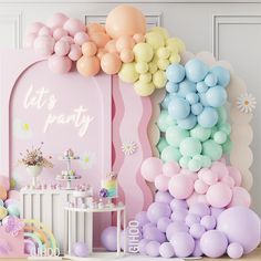 a party scene with balloons, cake and other items in pastel colors on the wall