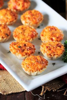 small appetizers on a white plate with broccoli