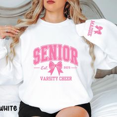 Get cozy with this stylish Unisex Heavy Blend™ Crewneck Sweatshirt, perfect for chilly days and laid-back outings. The sweatshirt exudes a relaxed vibe, making it the ideal choice for casual gatherings, school events, or cozy nights in. It's particularly relevant for students celebrating graduation, spirit weeks, or homecoming events. Made with a soft blend of 50% cotton and 50% polyester, it promises durability and comfort, ensuring you stay comfy and stylish season after season. This sweatshirt is perfect for those who appreciate casual wear that still looks sharp, offering a great fit for anyone looking to express their style with ease.  Perfect for gifting during the fall and winter holidays, or as a part of your casual wear for any occasion where you want to feel warm and look good at Cheer Sweatshirts Design, Cheer Crewneck, Cheer Sweater, Spirit Weeks, Senior Cheerleader, Varsity Cheer, Class Of 2025, Cheerleading Outfits, Spirit Week