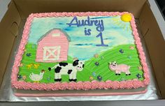 a birthday cake with farm animals on it