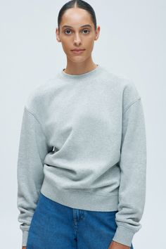 Designed to be lived in. A sleek crew-neck sweatshirt, featuring a slight dropped shoulder and inset sleeves—an understated look that can be dressed up or down. Women's Essential Sweatshirt Essential Sweatshirt, Grey Sweats, Basic Sweaters, Dad Jeans, Women Essentials, Favorite Sweater, Baggy Fits, Jeans And Boots, Heather Grey