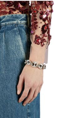 Express your individuality with this Sterling Silver Interlocking G Marina Chain Bracelet from Gucci. Adorned with a three-dimensional flower motif, this bracelet has a vintage look that will add a unique touch to your style. It is 21cm in length and features an antique-effect clasp and engraved details. Perfect for casual wear, this bracelet showcases the finest Italian craftsmanship. Shop our Jewellery Collection. Sterling Silver Jubilee Link Bracelet, Luxury Metal Bracelets With Jewels, Luxury Chain Link Bracelets For Parties, Designer Jubilee Bracelet Jewelry In Metal, Luxury Chain Link Party Bracelets, Designer Metal Jubilee Bracelet, Vintage Gucci Jewelry For Formal Occasions, Vintage Gucci Jewelry For Formal Events, Sterling Silver Jubilee Chain Bracelet For Party