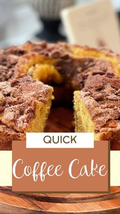 a coffee cake on a wooden platter with the words quick coffee cake above it