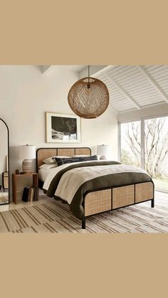 a bed room with a neatly made bed and a hanging light above the headboard