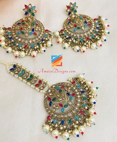 Multicolored Oversized Polki Earrings Tikka Set Available to shop online and delivered to your doorsteps anywhere in the world with our Everything-Everywhere FREE Shipping. 📦Unmatched FREE Worldwide Shipping EXPLORE more Indian Earrings and Jhumki Earrings. Maang Tikka Sets and Tikka Set Punjabi Match with our pretty Single Line Necklaces Rajveer, Canada ⭐️⭐️⭐️⭐️⭐️ I bought chokkar set from this website. I really loved the set and couldn’t express my feelings when I opened the box with thank yo Express My Feelings, Maang Tikka Set, Polki Earrings, Jhumki Earrings, Maang Tikka, Chur, My Feelings, Indian Earrings, Single Line