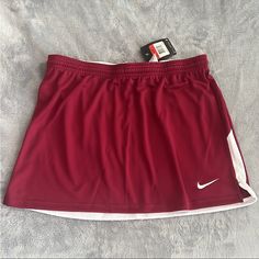 Red Lacrosse Skirt Nwt Never Worn Brand: Nike Size L White Detailing Does Not Have Shorts Or Lining Underneath Adjustable Waist Super Cute Athletic Skirt. Would Be Perfect For Causal Working Out Walking Hiking Etc ;) Nike Mini Skort, Red Sports Skort For Summer, Nike Short Lined Skirt, Casual Red Skort, Red Sporty Skort For Sports, Sporty Red Skort For Sports, Casual Red Sports Skort, Red Casual Sports Skort, Red Casual Skort For Sports