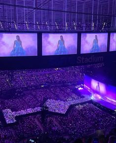 the stage is lit up with purple lighting