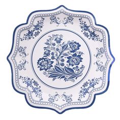 a blue and white plate with floral designs on the rim, set against a white background