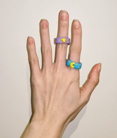 "Star and Moon Rings" are completely handmade and unique. They are made by air-dry clay, which is environmental friendly material without baking in oven and very light, which will not make your hand uncomfortable. These rings are painted and shaped very detailed, however they have tiny handmade traces. - Material: Padico La Doll air dry clay Padico sealer super gloss - Weight: 2g - Size: 60mm (USA9.5) Due to the hand-crafted nature of this collection, I am unable to reproduce the exact same desi Handmade Rings Clay, Fimo Ring, Rings Clay, Moon Rings, Star And Moon, Moon Ring, Environmental Friendly, Handmade Rings, Dry Clay