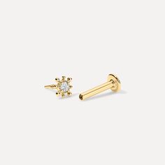 Details: This minimal yet impactful Mini Sunburst Threaded Studs in 14K gold is the perfect addition to any ear game. 14K solid gold Diamonds: GH-SI Flatback 16 gauge Sold as a single earring Available in 14K yellow gold Please allow 2-4 weeks to process your order *Due to strict health and safety regulations, all piercings and earrings are final sale with no exceptions. For information about additional lengths, please contact us via email at info@kellybellodesign.com Celestial Single Earring In Yellow Gold, Gold Starburst Single Earring, Celestial Yellow Gold-plated Earrings, All Piercings, Dainty Yellow Gold Earrings With Screw Back, Gold Sun Earrings Studs, Single Earring, Health And Safety, Final Sale