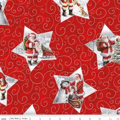 a red and white christmas fabric with santa claus