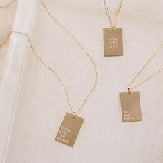 Personalize your Dani pendant with a date, phrase, initials and more. (Up to 4 lines, 6 characters each line.) We love the modern shape and minimalist design. Hangs along a dainty gold cable chain. DETAILS 14kt gold filled Engraving included: Up to 4 lines, 6 characters each line Choose necklace length Model wearing 18 inches