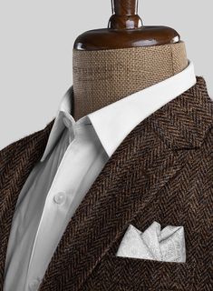 If you're looking for a sophisticated jacket as well as you want to appear chic and polished then our Harris Tweed Dark Brown Herringbone jacket will be a perfect pick for a modernized spin. Crafted from pure wool, the jacket will give you extra fashion points as it exudes herringbone pattern, also called broken twill weave that adds a wow factor to the overall attire.   Look Includes  Harris Tweed Dark Brown Herringbone Fabric  Two Button Jacket Style  Notch Lapel  Real Horn Brown Buttons  Sing Extra Fashion, Herringbone Suit, Herringbone Jacket, Classic Menswear, Herringbone Fabric, Men Classic, Twill Weave, Button Jacket, Harris Tweed