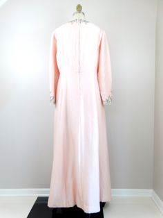 "This is an exquisite vintage silk gown beautifully detailed and hand beaded. It's in excellent condition! Measurements: Bust - 40\" Waist - 34\" Hips - 52\" Length - 56\" Tag Size - please refer to measurements This dress comes from a pet-free and smoke-free home. If you would like more info or have any questions, please don't hesitate to ask!" Embellished Wedding Maxi Dress, Silk Sequined Maxi Dress For Wedding, Long Embroidered Evening Gown, Vintage Embellished Silk Dress, Embellished Long Evening Gown, Long Embellished Evening Gown, Vintage Silk Dress With Beading, Vintage Beaded Silk Dress, Embellished Floor-length Vintage Evening Dress