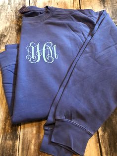 This is our most popular monogrammed shirt and when you order one you will see why! So many colors to choose from and so many vinyl options and monogrammed fonts you will want one of each! Comfort colors are pigment dyed shirts that are unisex sized and do NOT shrink up. In the notes to seller at checkout please leave: 1. Vinyl Color 2. Monogram in the order you would like it to appear on the shirt (First, Last, Middle is traditional) 3. Shirt color (This listing is for a left chest monogram) se Personalized Cotton T-shirt For Fall, Cotton Monogram Long Sleeve Sweatshirt, Monogram Cotton Tops For Fall, Cotton Monogram Sweatshirt, Fall Cotton Tops With Monogram, Blue Monogram Cotton Tops, Personalized Blue Cotton Tops, Vinyl Monogram, Comfort Colors Tshirt