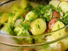 a glass bowl filled with lots of food