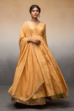 Mango pleated anarkali with floral vine pattern and beaded accents on the neckline. Paired with a palazzo and dupatta with beaded border. - Aza Fashions Traditional Drape Dress In Cotton Silk With Gota Work, Traditional Drape Cotton Silk Dress With Gota Work, Traditional Drape Dress With Gota Work In Cotton Silk, Elegant Floor-length Traditional Wear With Gota Work, Elegant Floor-length Kurta With Cutdana, Elegant Navratri Anarkali Set With Resham Embroidery, Elegant Resham Embroidery Anarkali Set For Navratri, Elegant Floor-length Kurta With Gota Work, Elegant Resham Embroidery Art Silk Anarkali Set