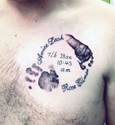 a man with a tattoo on his chest that has an image of a bear and handprint