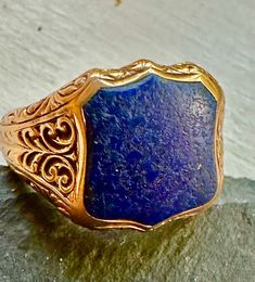 "14k Victorian Ring, bold shield shaped genuine undyed Lapis, wonderful engraving and balance to the design.  Condition is very good for its age, any slight wear commensurate with age.  Size 8 1/3, 1/2\" south to north on finger, hefty wt. - 9.2 grams.  Unisex, outstanding classic design." Antique Yellow Gold Engraved Carved Ring, Antique Carved Yellow Gold Engraved Ring, Antique Carved Engraved Yellow Gold Ring, Antique Style Carved Engraved Yellow Gold Ring, Oval Engraved Signet Ring For Collectors, Formal Carved Signet Ring In 14k Gold, Carved 14k Gold Signet Ring For Formal Occasions, Carved Signet Ring In 14k Gold For Formal Occasions, Antique Carved Signet Ring For Formal Occasions