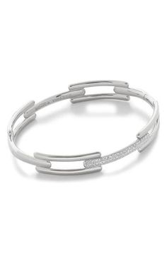 Add a glamorous twist to your wrist with a sculpted bangle handcrafted from recycled sterling silver with a front bar adorned with pavé lab-created diamonds. Exclusive US retailer Medium=6 1/2" inner circumference; 3/8" width Total lab-created-diamond weight: 0.3709ct. Hinge with tongue-and-groove closure Recycled sterling silver/lab-created diamond Imported >Diamond Guide Modern Diamond Bangle With Polished Finish, Modern Metal Bracelets With Diamond Accents, Modern Silver Cuff Bracelet With Diamond Accents, Modern White Gold Diamond Bangle Bracelet, Modern Sterling Silver Diamond Bracelet With Polished Finish, Modern Silver Diamond Bangle Bracelet, Modern Sterling Silver Bracelets With Diamond Accents, Modern Single Cut Diamond Cuff Bracelet, Modern Single Cut Diamond Bracelet