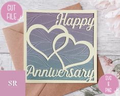 an anniversary card with two hearts on it