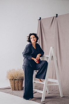 "Blue linen pants for women, flowy palazzo pants, streetwear linen trousers. The wide leg pants, a staple in any wardrobe, features a wide-legged flowing leg to make you feel carefree and effortless throughout your day.  DETAILS ◾ this baggy pants have an elastic waist for extra comfort; ◾ the waistband can be loosened or tightened by its drawstring front; ◾ easy cut, slightly dropped crotch, medium waist and maxi length; ◾ deep pockets at side seams; ◾high-quality tailoring, double French seams, neat seamy side; ◾ linen pants made of softened organic fabric with unique stonewashed finish. The fabric doesn't shrink. It doesn't sheer and pleasant for the body. ◾shown in a blue fog colour. It is available for order in any other colour of the palette. IMAGES: Model Lesia is 162cm/5'4\" Model' Linen Wide Leg Straight Pants For Loungewear, Linen Wide Leg Loungewear Pants, Linen Wide Leg Pants For Loungewear, Flared Linen Pants, Linen Pants For Women, Blue Linen Pants, Pants Streetwear, Linen Clothing, French Seam