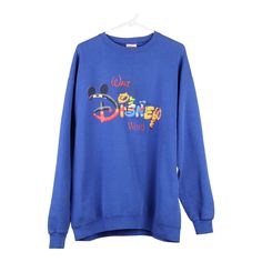 Vintage blue Disney World Mickey Inc Sweatshirt - mens x-large Mickey Mouse Long Sleeve Sweatshirt For Streetwear, Long Sleeve Mickey Mouse Sweatshirt For Streetwear, Vintage Blue Sweatshirt With Graphic Print, Blue Long Sleeve Top With Mickey Mouse, Vintage Blue Sweatshirt For Streetwear, Blue Throwback Sweatshirt With Graphic Print, Blue Long Sleeve Throwback Top, 90s Blue Graphic Sweatshirt, Blue 90s Graphic Print Sweatshirt