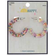 Don't be content to blend in! Use these Multi-Color Confetti Hoop Earrings to stand out and shine like the superstar you are. These post-style hoop earrings hook around the ear lobe. The earrings are made of clear resin that's filled with a rainbow of iridescent and metallic confetti. Wear them with a plain outfit for some fun contrast! Details: 	 Length: 1 3/8" 	 Width: 1 3/8" 	 Metal Color: Silver Card contains 1 pair of earrings. New Year's Eve Crafts, Silver Card, Be Content, Plain Outfits, Clear Resin, Online Earrings, A Rainbow, Hobby Lobby, Metal Color