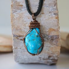 Feel whole with your Spirit guides leading you when you wear this raw turquoise necklace. Handmade with positive vibes, turquoise aids in self-acceptance, self-forgiveness, communication and feeling whole. You can wear this genuine turquoise pendant on either side, due to the pendant's handcrafted reversible design. Each stone ranges in shape, size and shade of blue colour, creating a unique pendant for you that won't be duplicated (please see our variation image for possible options that may co Mens Turquoise Necklace, Turquoise Amulet Jewelry For Meditation, Spiritual Turquoise Necklace Gift, Spiritual Turquoise Necklace As Gift, Artisan Turquoise Hand Wrapped Necklaces, Artisan Hand Wrapped Turquoise Necklaces, Handmade Spiritual Turquoise Necklace For Healing, Artisan Hand Wrapped Turquoise Necklace, Spiritual Turquoise Gemstone Necklace For Meditation