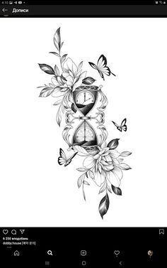 an image of a clock with flowers and butterflies on the screen, in black and white