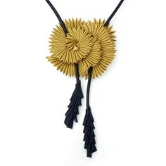 Fiber Necklace - Marrying natural inspiration and unconventional technique, artist Sophia Hu weaves polyester fibers into a necklace that entrances with a rhythmic yet refined design, mimicking the petals of a blooming chrysanthemum. Bolo-style suedecord with tassels, easily adjustable up to 34. Fiber Necklace, Bolo Necklace, Natural Inspiration, Artful Home, Chrysanthemum, Leather Cord, Jewelry Crafts, Nature Inspiration, Tassels