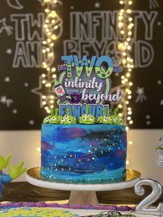 a two - tiered birthday cake with the words two twenty and beyond on it