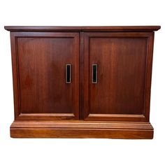 a large wooden cabinet with two doors