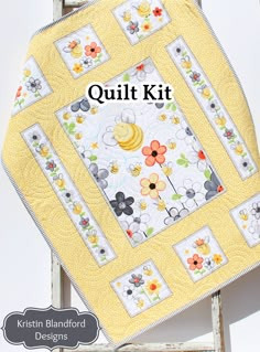 the quilt kit is sitting on top of an old chair with it's cover removed