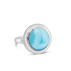 They say that simplicity is the ultimate form of sophistication. Our Neptune Cocktail Ring has been thoughtfully designed to showcase a stunning Larimar cabochon in the most sophisticated and simple way. This is the perfect design to start your Dune collection and a definite must-have for all of our Dune enthusiasts! This product is able to ship in two business days when ordered alone .925 Sterling Silver and Larimar Graceful, round design measures 20mm in diameter Setting is approximately 15mm Elegant Blue Larimar Rings, Elegant Blue Larimar Turquoise Ring, Elegant Oval Larimar Rings, Dune Jewelry, Larimar Jewelry, Earth Elements, Rare Gemstones, Round Design, Cocktail Ring