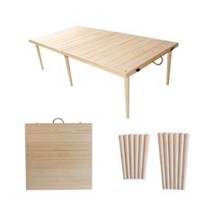 a wooden table with four pieces of wood next to it on a white background,