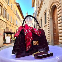 This bag has been made of the best genuine leather by local master crafters of Florence in Italy, designed for women who only accept premium Italian quality and luxury leather bags and modern Italian fashion. . Sizes: Width:   27 cm/10.75 inch Height:  19 cm/7.50 inch Depth:    9 cm/3.50 inch Color: Wine Red . The story behind this bag: It was the day of her mother's birthday, and Giulia wanted to give her something special. Her mother had always been an inspiration to her, and she wanted to express her love and gratitude through a meaningful gift. After some research, she found the perfect gift - an elegant leather bag handmade in Florence, Italy. The bag was crafted with care and precision, using only the finest Italian leather. It was a luxurious tote bag that exuded elegance and sophis Handmade Leather Tote Bag, Handmade Leather Bags, Luxury Leather Bag, Italy Wine, Italian Leather Bags, Red Tote, Red Handbag, Leather Bags Handmade, Clothing Rack