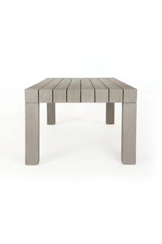 an outdoor table made out of concrete blocks