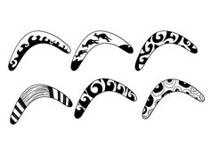 four black and white swirls on a white background, each with an abstract design