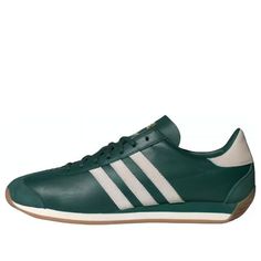 adidas Country OG 'Collegiate Green' IH7514 Green Leather Sneakers With Three Stripes Branding, Green Sports Sneakers With Three Stripes Branding, Green Adidas Sneakers For Sports, Green Three Stripes Sports Sneakers, Green Three Stripes Sneakers For Sports, Green Sneakers With Three Stripes Branding For Sports, Green Sneakers With Three Stripes For Sports, Green Sneakers With Three Stripes Branding, Green Sporty Sneakers With Three Stripes