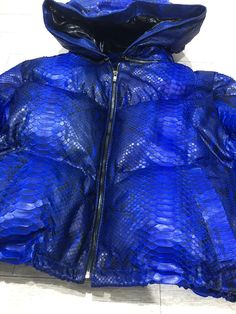 Snakeskin DUCK DOWN Jacket for women. WINTER COLLECTION 2020/2021 A jacket made from genuine python leather. Removable hood. Outside: GENUINE PYTHON LEATHER Inside: DUCK DOWN 100% Accessories: silver color (please see the photo). Lining: MONCLER All our products are 100% handmade, we always try to create interesting ideas to make your style unique. We use only the highest quality materials and accessories from around the world and only best leather from Indonesia. Before listing each new model u Best Leather, Duck Down Jacket, Leather Rucksack, Accessories Silver, Stylish Backpacks, Interesting Ideas, Jacket For Women, Trendy Gift, Duck Down