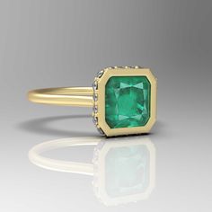 1.50 Carat Real Green Emerald Diamond Ring - 14k Gold Emerald Ring - Genuine Emerald Wedding Ring - Emerald Dainty Ring - Asscher Cut Ring GEMSTONE DETAILS : ✦ Gemstone : Natural Zambian Emerald ✦ Gemstone Size : 7 mm ✦ Gemstone Shape : Asscher Cut ✦ Number of Gemstones : 1 ✦ Gemstone Weight : 1.50 Carat ✦ Gemstone Grade : AAA DIAMOND DETAILS : ✦ Diamond Type : Natural ✦ Diamond Size : 1.5 MM ✦ Diamond Color : G-H ✦ Diamond Clarity : Slightly included ✦ Diamond Cut : Excellent ✦ Diamond Weight : 0.60 Carat METAL DETAILS : ✦ Metal : 14K/18K /22K Gold ✦ Metal Color : Yellow / White / Rose Gold ✦ Setting : Bezel Setting ✦ Box : Yes SHIPPING DETAILS : ✦ Production time : 3-4 days ✦ Delivery time : 7-8 days ✦ Expedited shipping : Available ✦ Expedited shipping service : UPS ✦ Expedited shipping Gold Emerald Ring, Asscher Cut Ring, Smaragd Ring, Real Green, Emerald Wedding Rings, Emerald Ring Gold, Rainbow Sapphires, Emerald Wedding, Emerald Diamond Ring