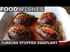 baked stuffed eggplant in a baking dish with text overlay reading food wishes turkish stuffed eggplant